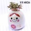 Spint of love growing toy grass head doll