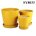 grid on yellow glazed ceramic flower pot