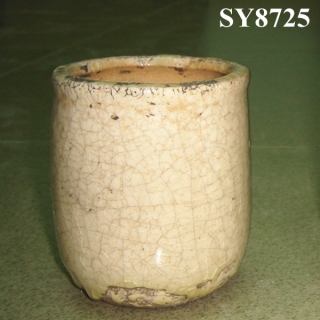 Round cream glazed ceramic antique pot