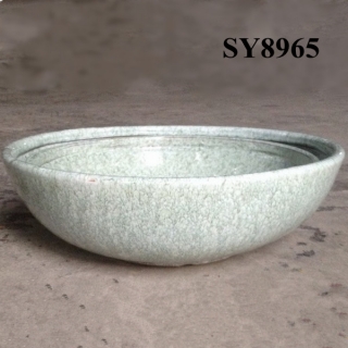 Plain green oval flower pot