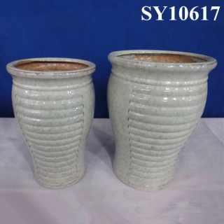 round cream ceramic outdoor plant pots