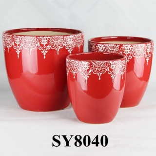Red glazed decorated flower pot