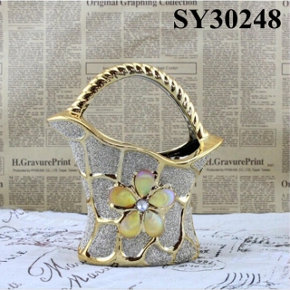 With golden flower galvanized flower vase