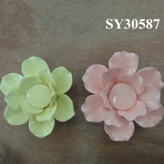 Delicate decorative ceramic flowers adorn