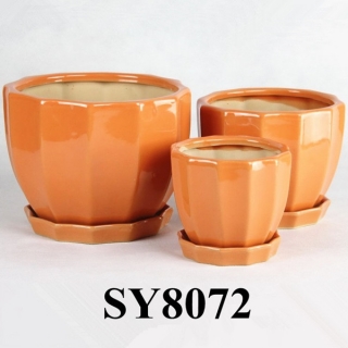 orange glazed ceramic flower pot planters