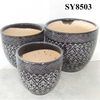 Black and white flower pattern coloured plant pots