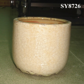 Round cream glazed porcelain antique pot