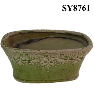 on glazed antique garden flower pot