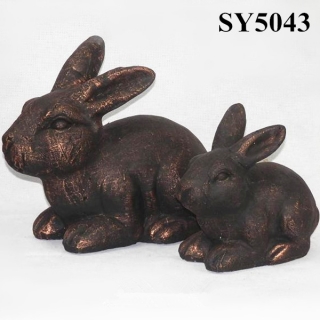 Antique brass rabbit garden statue