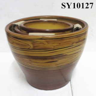 Round glazed ceramic pots and planters