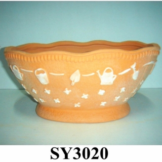 planter tool pattern on terracotta clay water pots