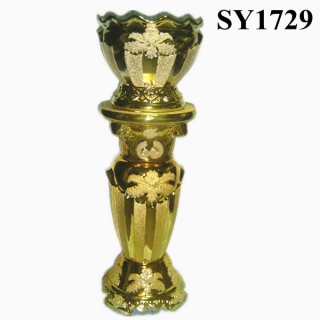 Tall golden decorative galvanized roman column