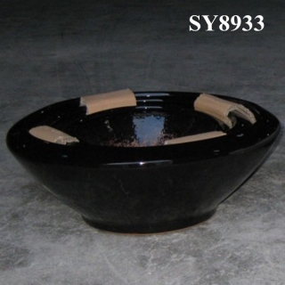 black glazed ceramic yard plant pot
