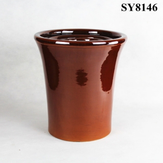 Dark brown tall glazed ceramic pot